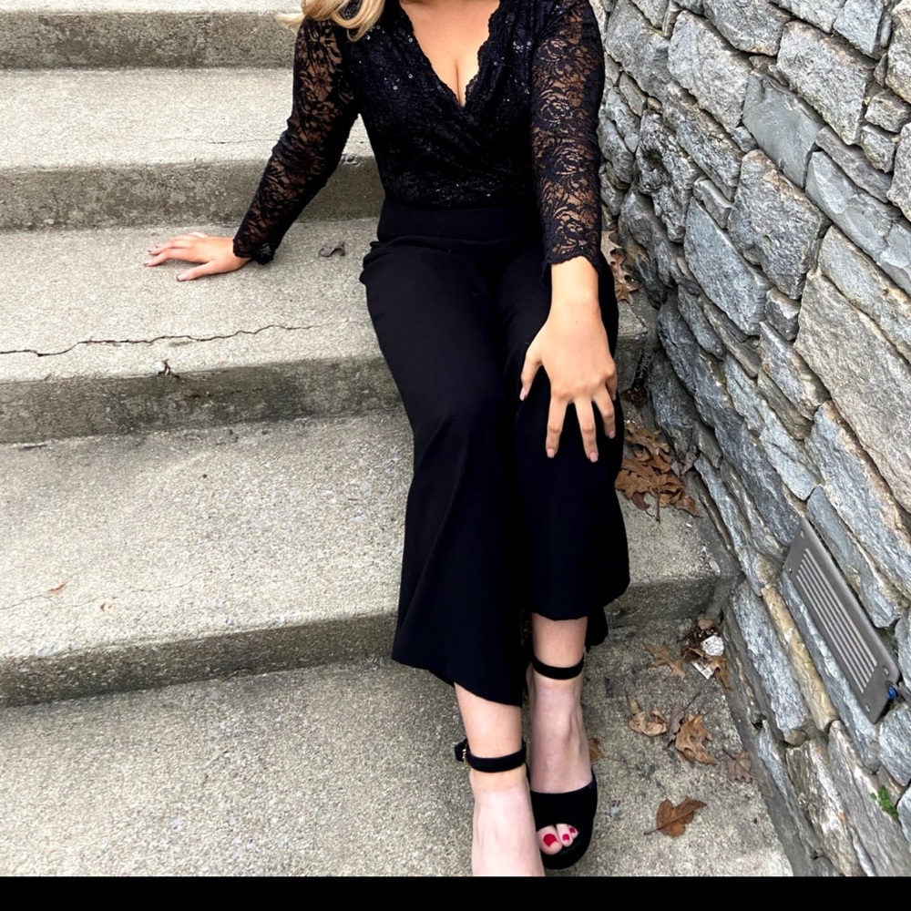 Women’s black jumpsuit perfect for a snowball dance.
